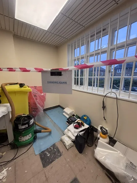 Asbestos floor tile and bitumen removal in Woolwich